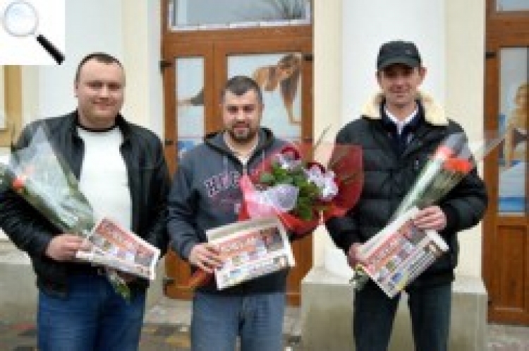 Новоградські козаки в чергах по квітки — надворі 8 Березня
